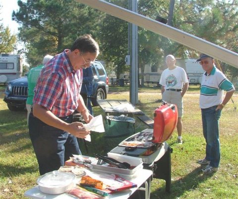 Dave grilling sausage.JPG