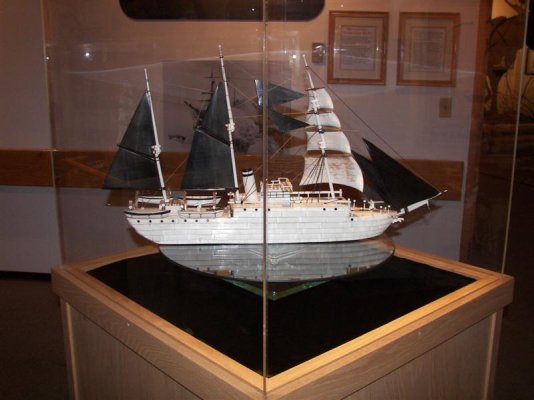 A tall ship model carved out of ivory.jpg
