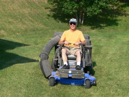 Dan Mowing the Grass.jpg