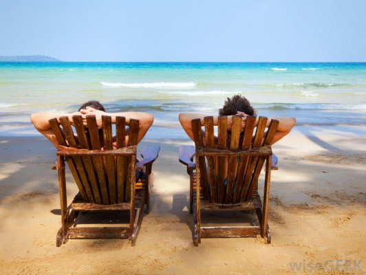 two-people-in-chairs-on-beach.jpg