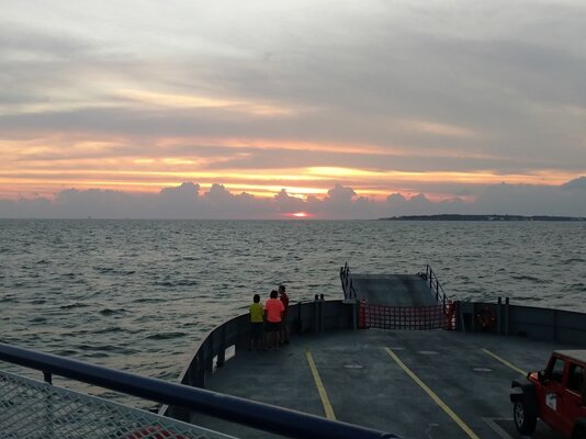 Sunset over the bay returning to Dauphin Island.jpg